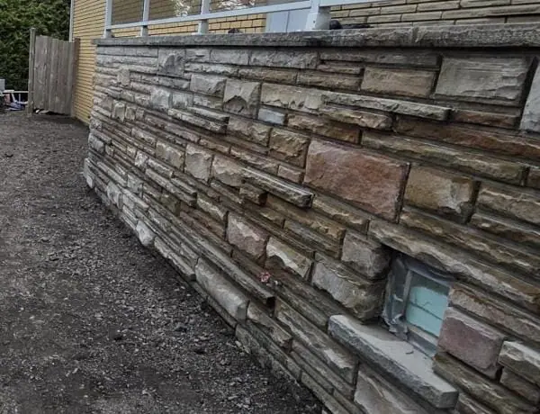 Close detail of layered ledgestone cladding